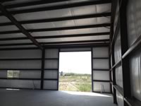 50' x 100' x 16' weld up with a 25' x 100' lean too for an Implement Shed/Workshop