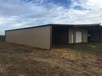 Lean too add-on for a tractor shed