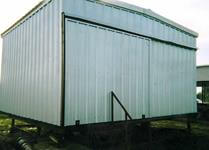 All welded portable storage building for an industrial pipe yard.