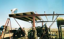 All welded metal compressor shed fabricated from the ground up.